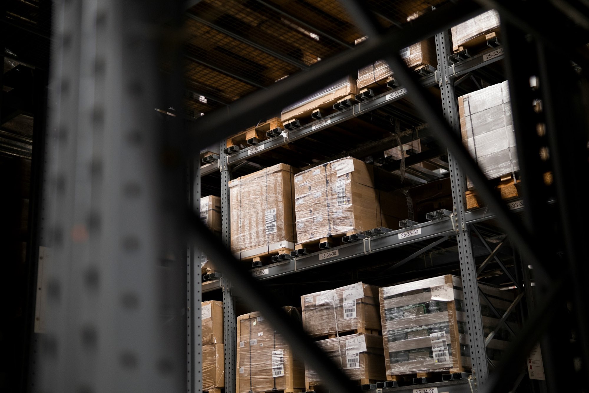 Pallets and shelving in a large distribution facility